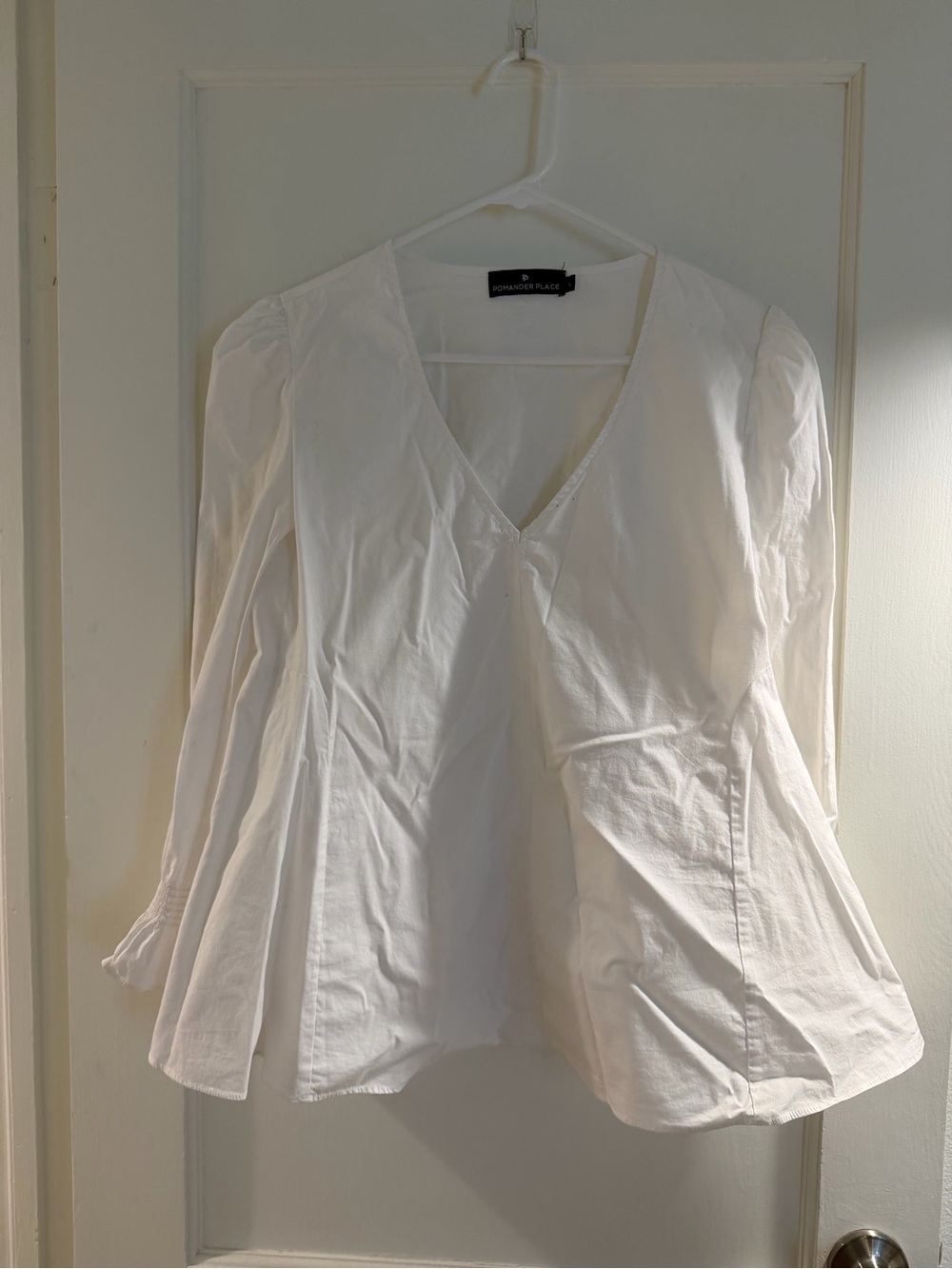 Pomander Place White V-Neck Peplum Blouse